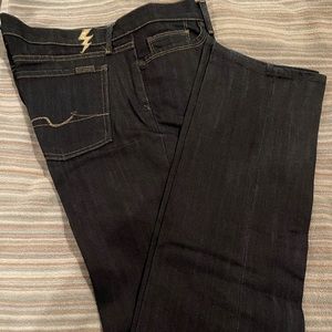 Seven for all Mankind dark wash jeans.